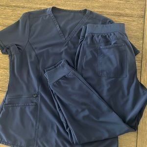 Navy blue scrubs, short sleeve shirt size large and jogger pants petite large